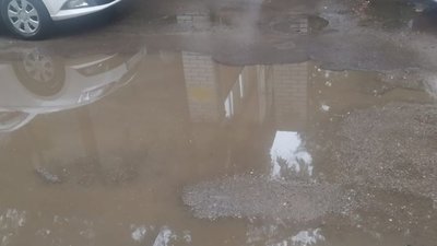 У Львові злива затопила дорогу до дитсадка (ФОТО)