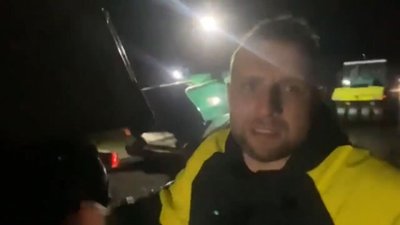 Велике будівництво: на Львівщині вночі у дощ кладуть асфальт на дорогу (ВІДЕО)